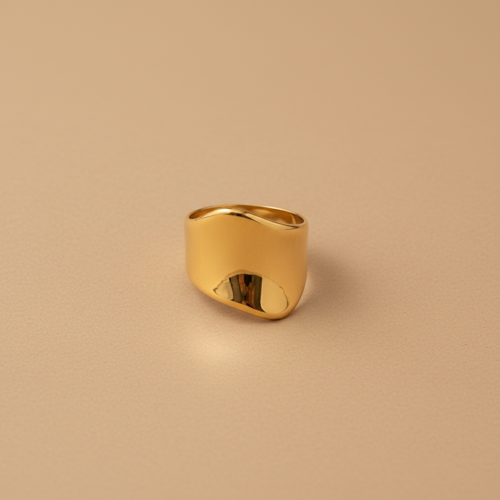 Bague large dorée à plat